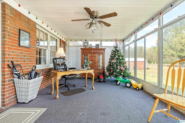 sunroom / solarium with ceiling fan and a healthy amount of sunlight