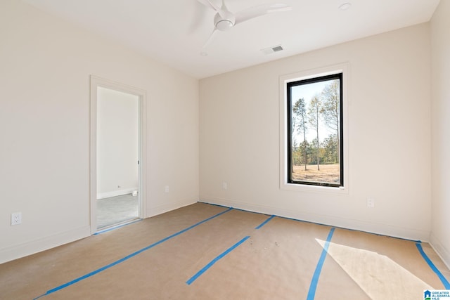 spare room with ceiling fan