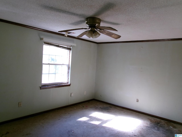 spare room featuring ceiling fan and a textured ceiling