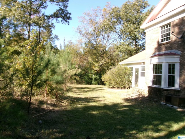 1663 County Road 2, Montevallo, AL 35115 - view of grassy yard with central air condition unit