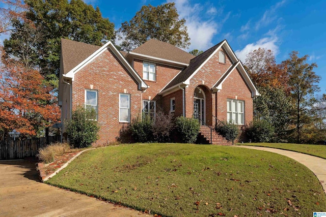 view of front property with a front lawn