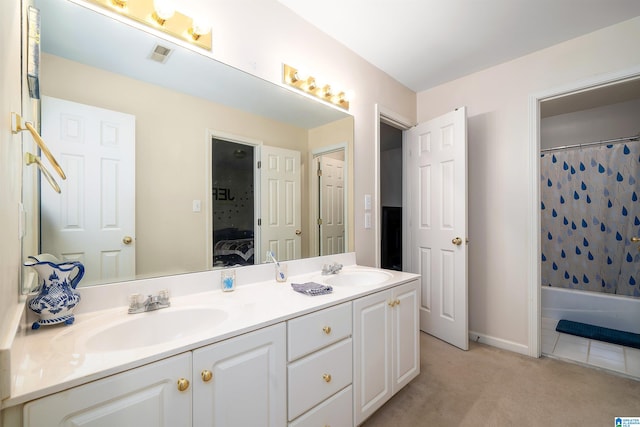 bathroom with tile patterned floors, shower / tub combo with curtain, and vanity