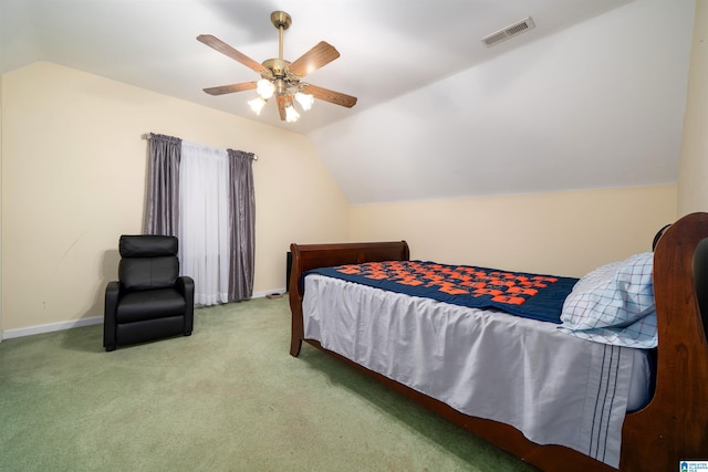 bedroom with carpet flooring, ceiling fan, and lofted ceiling