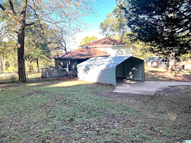 exterior space featuring a carport