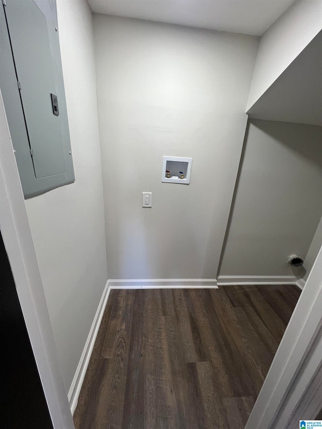 washroom featuring hookup for a washing machine, wood-type flooring, and electric panel