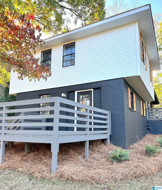 view of front of house with a wooden deck