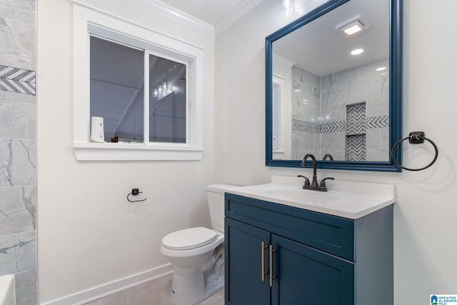 bathroom featuring tile patterned floors, crown molding, vanity, and toilet