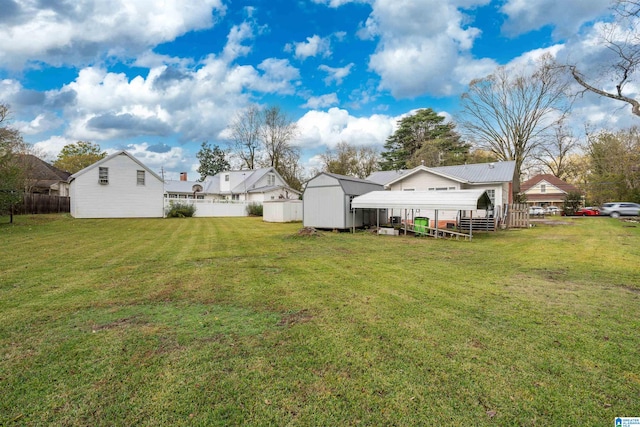 view of yard with a storage shed