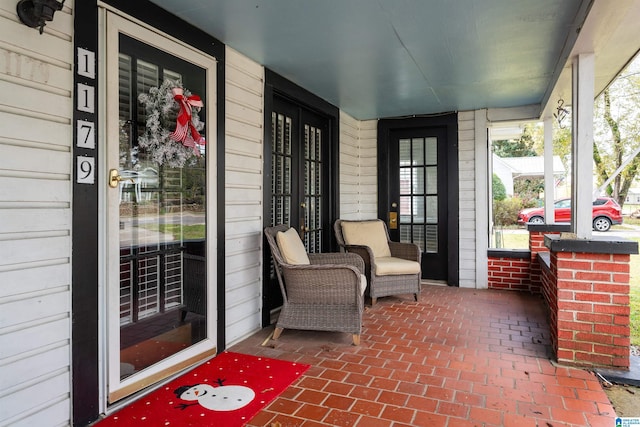 view of patio featuring a porch