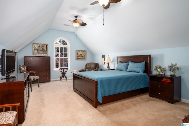 bedroom featuring ceiling fan, light colored carpet, and vaulted ceiling