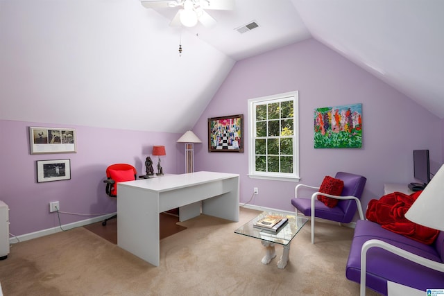 carpeted office space featuring ceiling fan and lofted ceiling