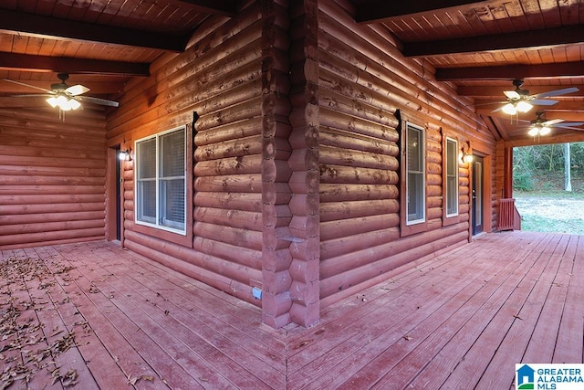 wooden terrace featuring ceiling fan