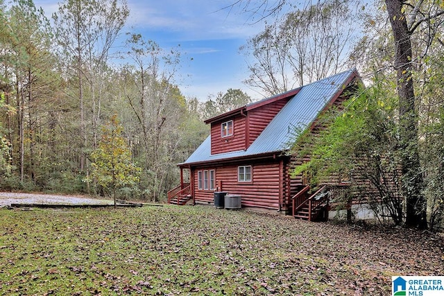 view of side of home with cooling unit