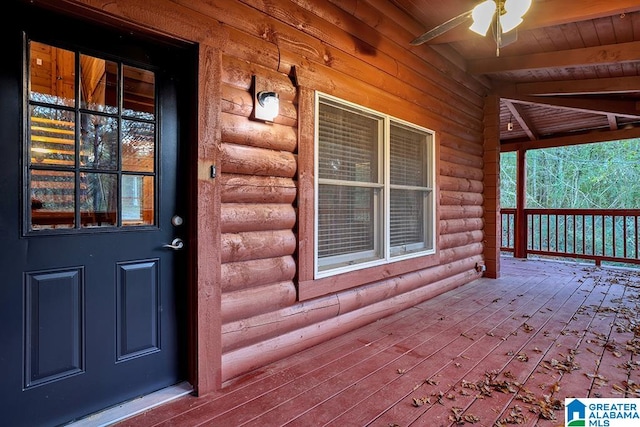 entrance to property with ceiling fan