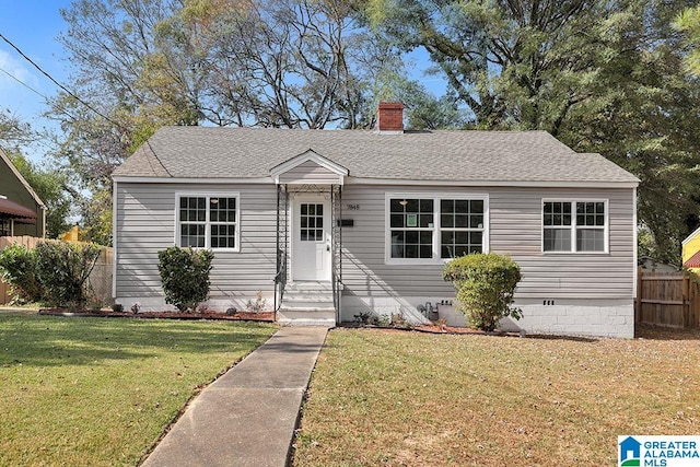 view of front of property with a front lawn