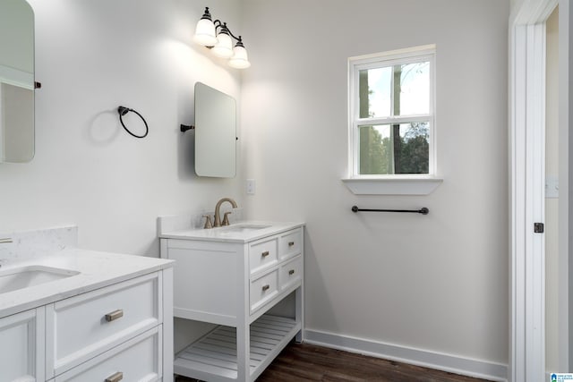 bathroom featuring vanity and wood-type flooring