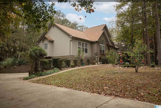 view of property exterior featuring a yard