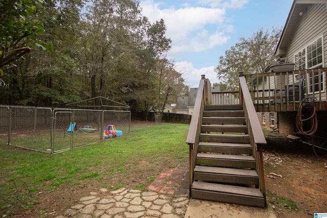 view of yard with a deck