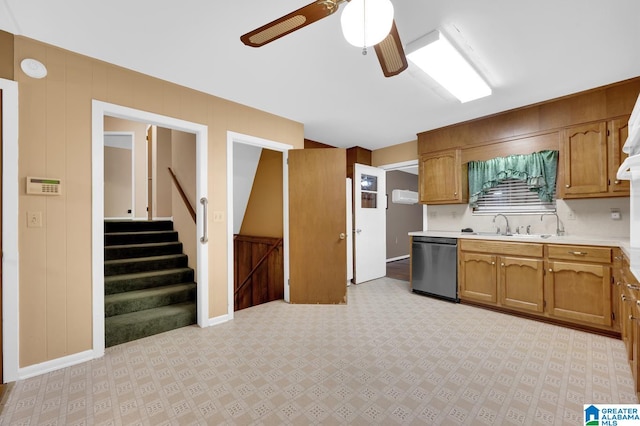 kitchen with ceiling fan, sink, and stainless steel dishwasher