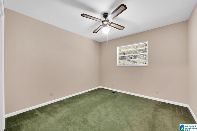 carpeted empty room featuring ceiling fan