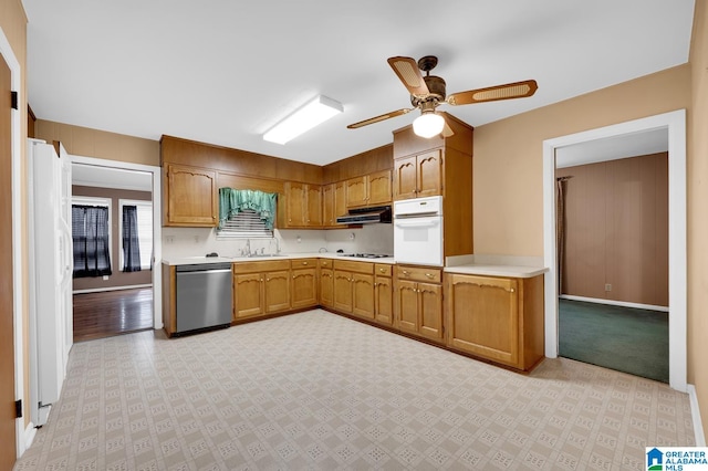 kitchen featuring white appliances, light hardwood / wood-style flooring, and ceiling fan