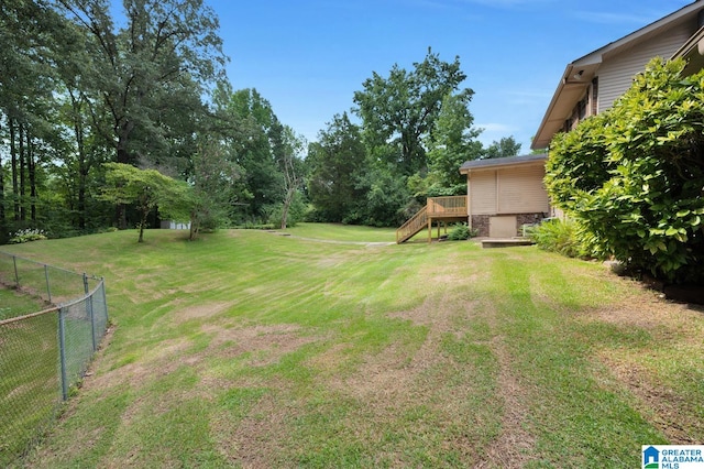 view of yard featuring a deck