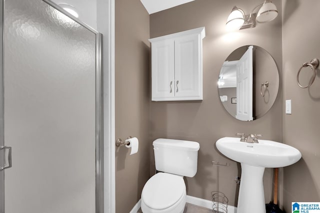 bathroom with toilet and sink