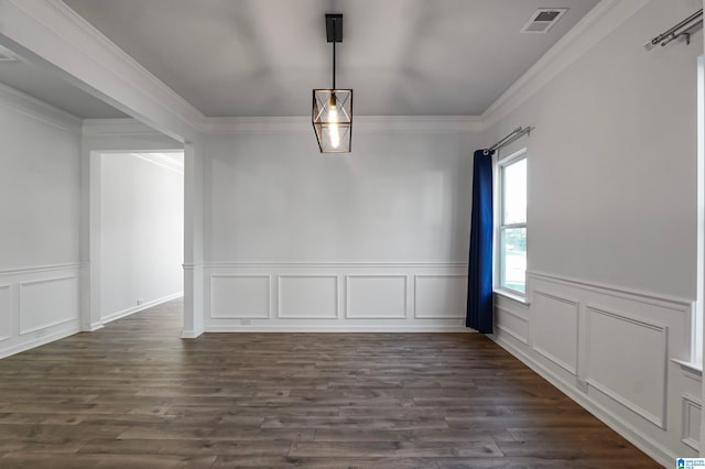 unfurnished dining area featuring dark hardwood / wood-style flooring and ornamental molding