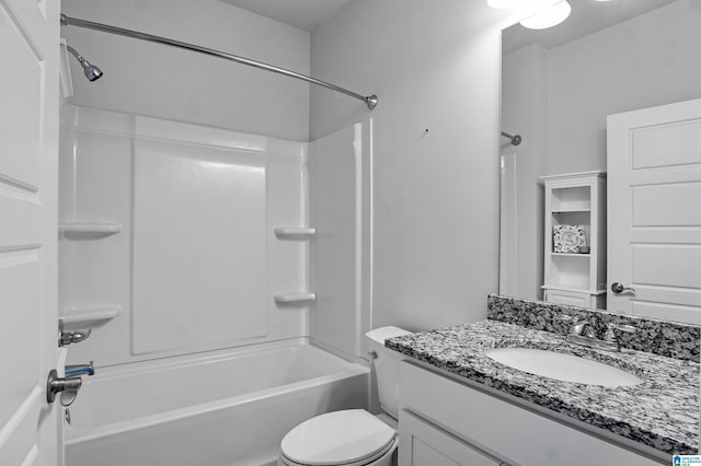 full bathroom featuring vanity,  shower combination, and toilet