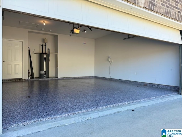 garage with electric water heater and a garage door opener