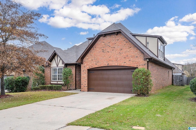 english style home featuring a front yard