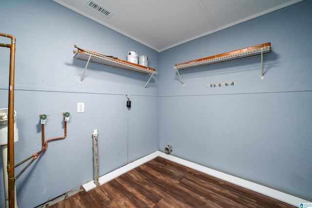 washroom with washer hookup and dark hardwood / wood-style floors