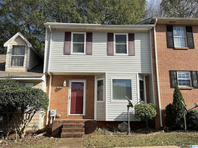 5807 Woodgate Cir, Anniston, AL 36207 - view of property with entry steps and brick siding