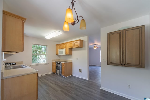 kitchen with ceiling fan with notable chandelier, sink, electric range, dark hardwood / wood-style floors, and decorative light fixtures