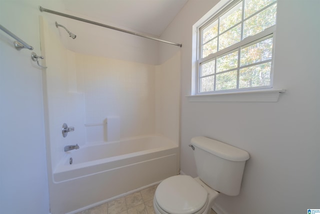 bathroom featuring toilet and bathtub / shower combination