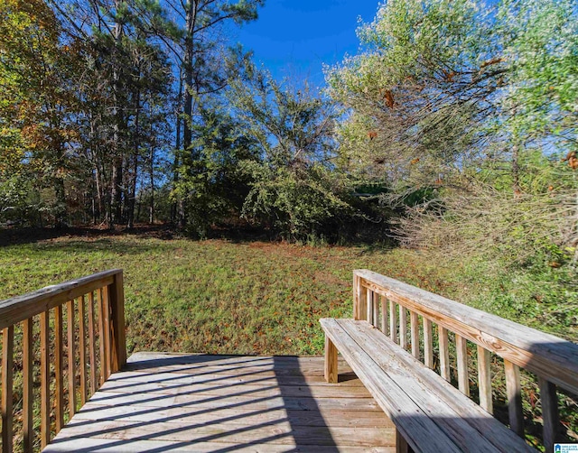 deck featuring a yard