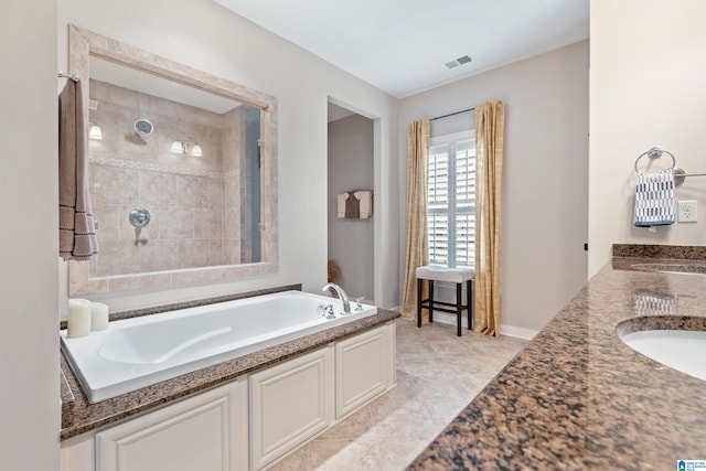 bathroom featuring sink and shower with separate bathtub