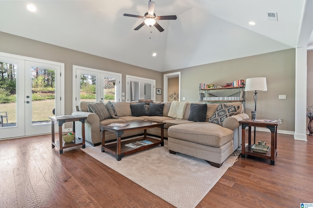 living room with ceiling fan, french doors, high vaulted ceiling, and dark wood-type flooring