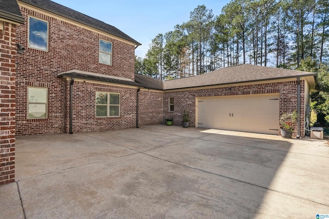 exterior space with a garage