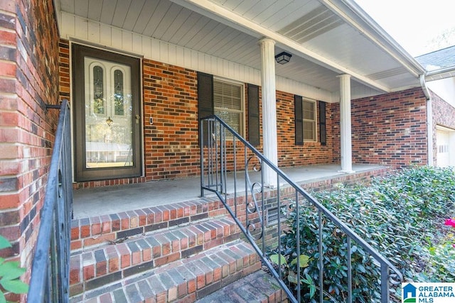 entrance to property with covered porch