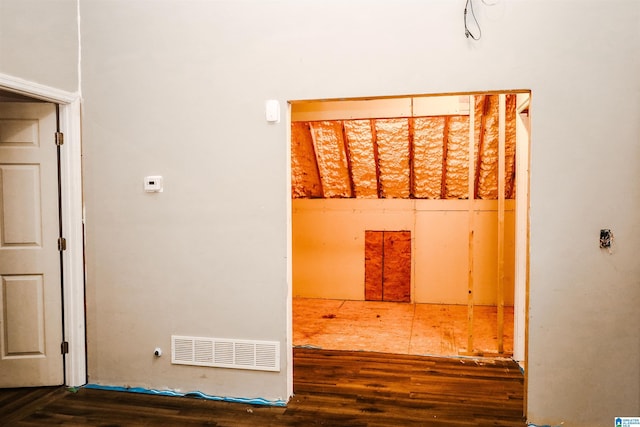 unfurnished room featuring dark hardwood / wood-style floors