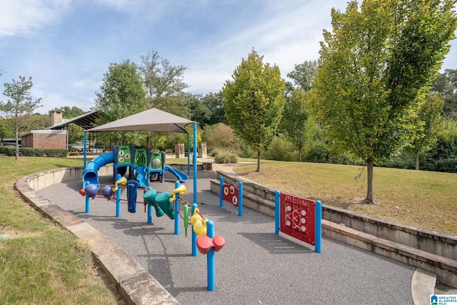 view of playground with a yard