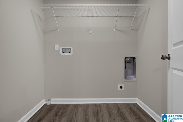 washroom featuring hookup for a washing machine, dark wood-type flooring, and hookup for an electric dryer