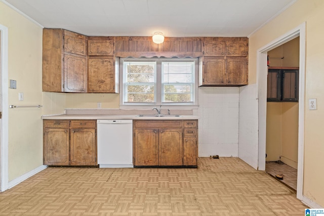 kitchen with light parquet floors, white dishwasher, ornamental molding, and sink