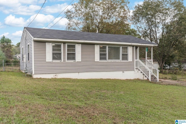 view of front of house with a front lawn