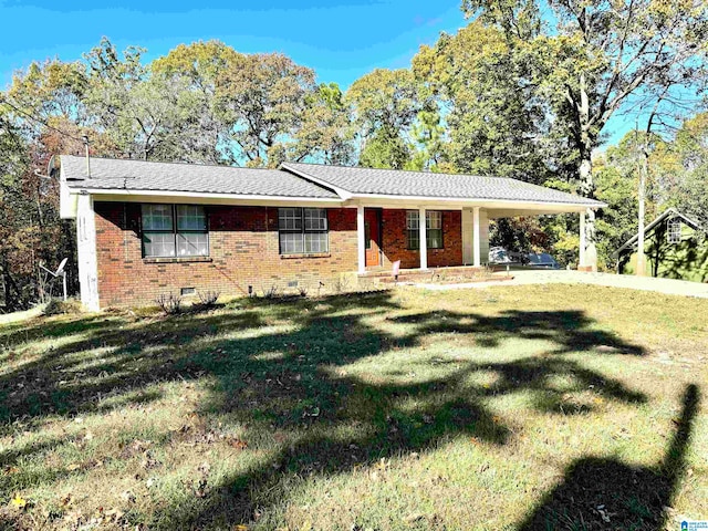 ranch-style home with a front yard