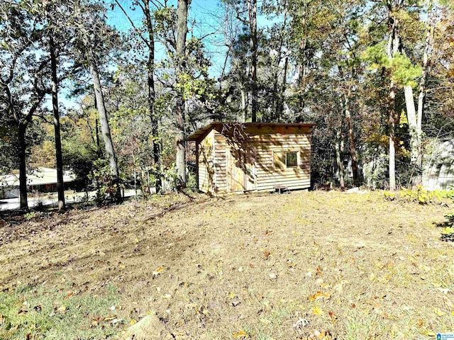 exterior space with a storage shed