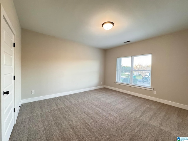 view of carpeted spare room