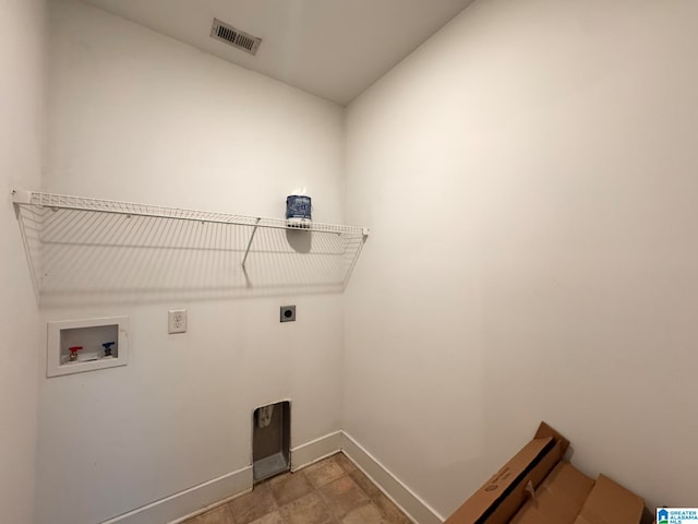 laundry area with hookup for an electric dryer and hookup for a washing machine