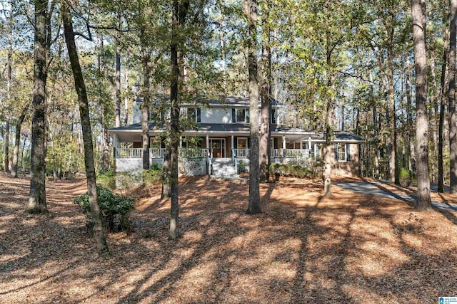 back of property featuring a porch